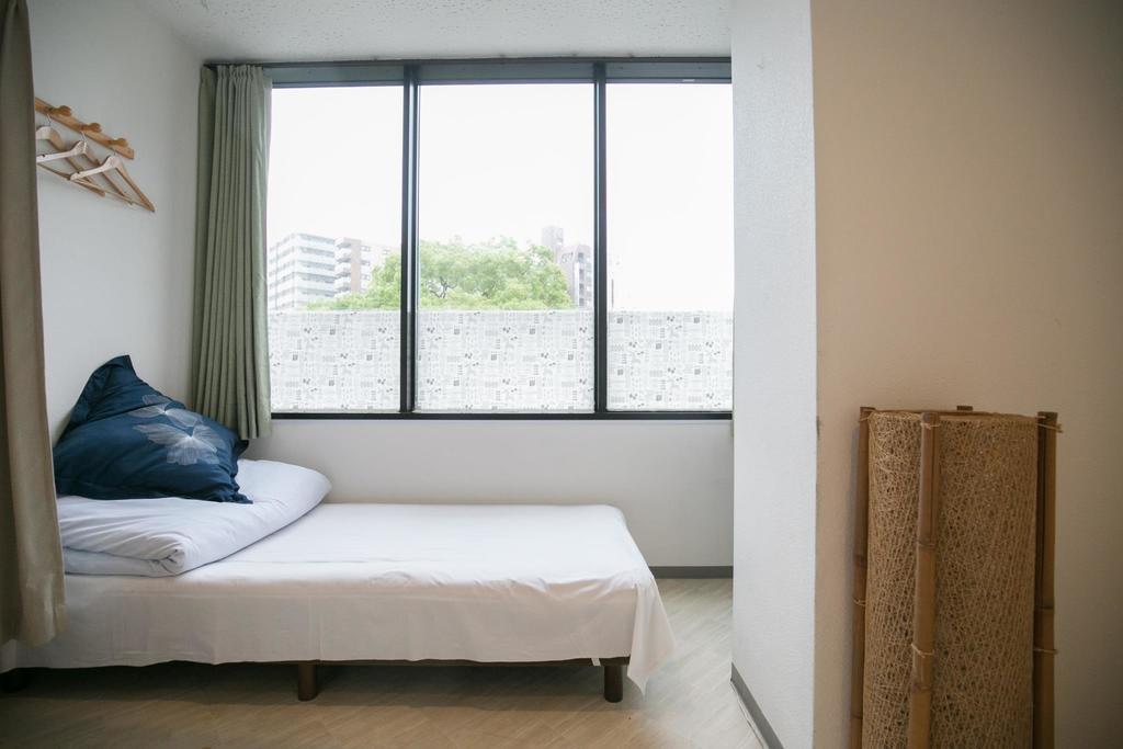 123 Guesthouse Osaka Værelse billede