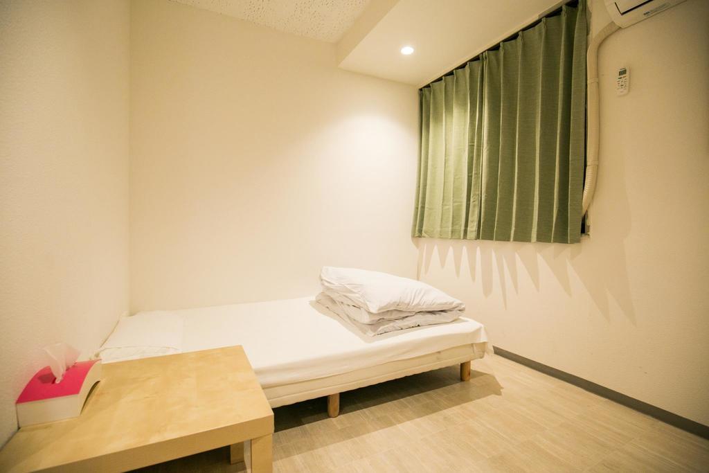 123 Guesthouse Osaka Værelse billede
